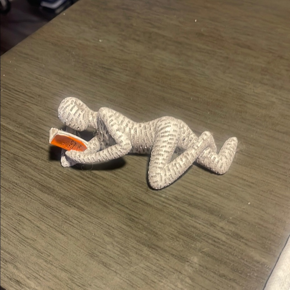 Gray Textured Figurine